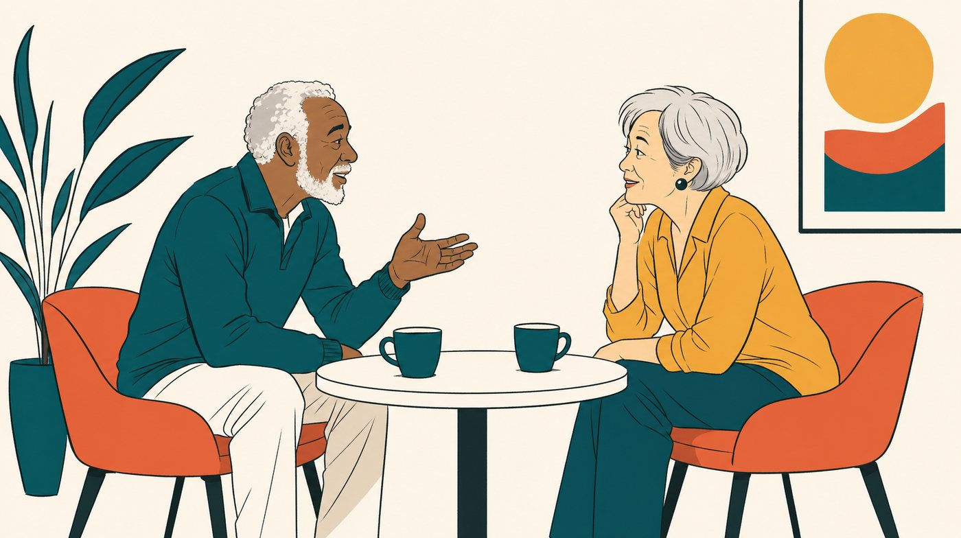 Two people across a small table, one leaning in to ask and the other listening with full attention